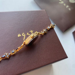 Reloj de cuarzo con pulsera vintage y disco de granate natural