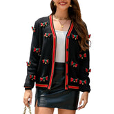 Suéter tipo cárdigan navideño con detalle de botones