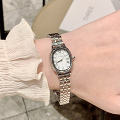 Reloj de acero con escala romana de nicho para mujer