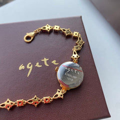 Reloj de cuarzo con pulsera vintage y disco de granate natural