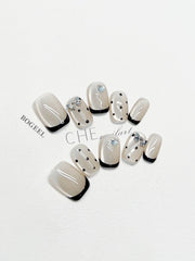 Handgetragenes kurzes Katzenauge