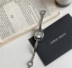 Reloj de pulsera con correa de acero y esfera artística retro de Niche para mujer