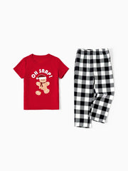 Conjunto de pijama familiar navideño a juego con top y cuadros con estampado de pan de jengibre