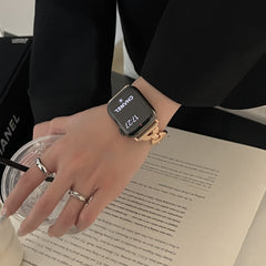 Reloj de metal con paleta redonda pequeña