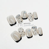 Handgetragenes kurzes Katzenauge