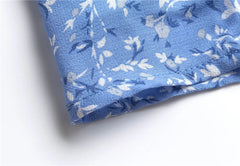 Vestido con mangas abullonadas y dobladillo con volantes