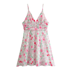 Minivestido floral con volantes y espalda abierta con lazo