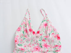 Minivestido floral con volantes y espalda abierta con lazo