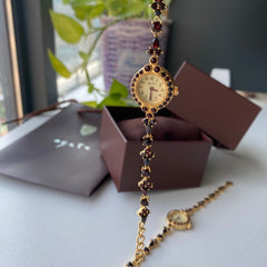 Reloj de cuarzo con pulsera vintage y disco de granate natural