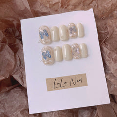 Parche de uñas con perla y mariposa desmontable