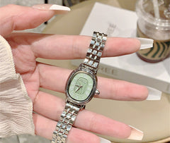 Reloj de acero con escala romana de nicho para mujer