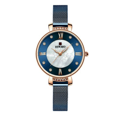 Reloj de mujer con correa de malla milanesa y delicado diseño de concha y diamantes
