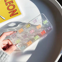Funda transparente para teléfono con osito de goma 3D colorido