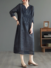 Vestido midi largo bordado por encima de la rodilla