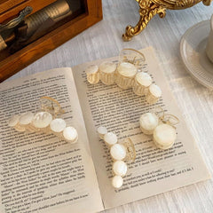 Schillernde Muschel-Haarklammer