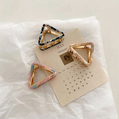 Mini pinza para el pelo triangular hueca