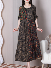 Vestido de corte A con cuello redondo y bajos los pies en la tierra