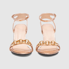 Sandalias de tacón fino con tiras en el tobillo doradas