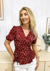 Wickeltop mit Blumenmuster und Puffärmeln