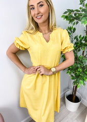 Vestido de lunares con cuello en V