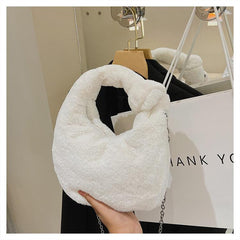 Flauschige runde Handtasche
