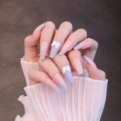 Uñas postizas largas cuadradas rosas y moradas con lazo