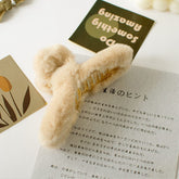 Flauschige Haarkralle