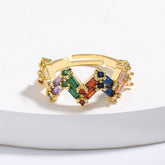 Anillo ajustable dorado en zigzag con diamantes de imitación de colores