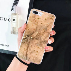 Funda para teléfono con copos dorados de mármol