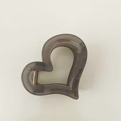 Garra para el cabello transparente en forma de corazón