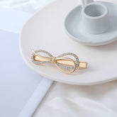 Horquilla con lazo redondo adornada con cristales