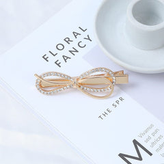 Horquilla con lazo redondo adornada con cristales