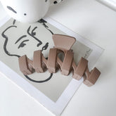 Pinza para el cabello ondulado mate