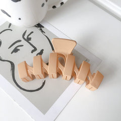 Pinza para el cabello ondulado mate