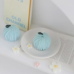 Vela decorativa de bola de hilo