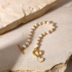 Pulsera chapada en oro de 18 quilates con cierre de corazón de perla de agua dulce