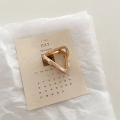 Mini pinza para el pelo triangular hueca