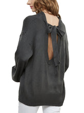 Suéter con mangas abullonadas y lazo de amor