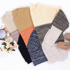 Suéter de punto texturizado con bloques de color