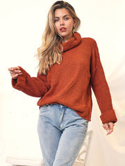 Suéter grueso de cuello alto