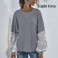 Suéter de punto con mangas de dos tonos