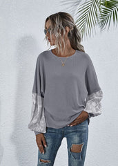 Suéter de punto con mangas de dos tonos