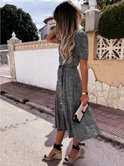 Maxivestido con puños, botones y bolsillo para atar