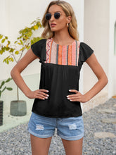 Blusa con volantes bordados