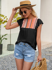 Blusa con volantes bordados