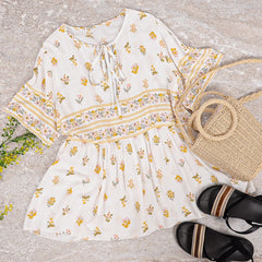 Blusa fruncida con estampado floral suave