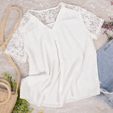 Blusa plisada con mangas de encaje