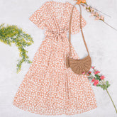 Kleid mit Blumendruck und asymmetrischem Saum