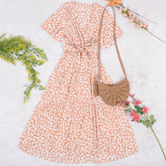 Vestido con dobladillo asimétrico y estampado floral