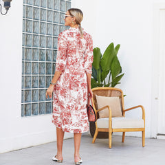 Kleid mit Vintage-Print und gestuftem Saum